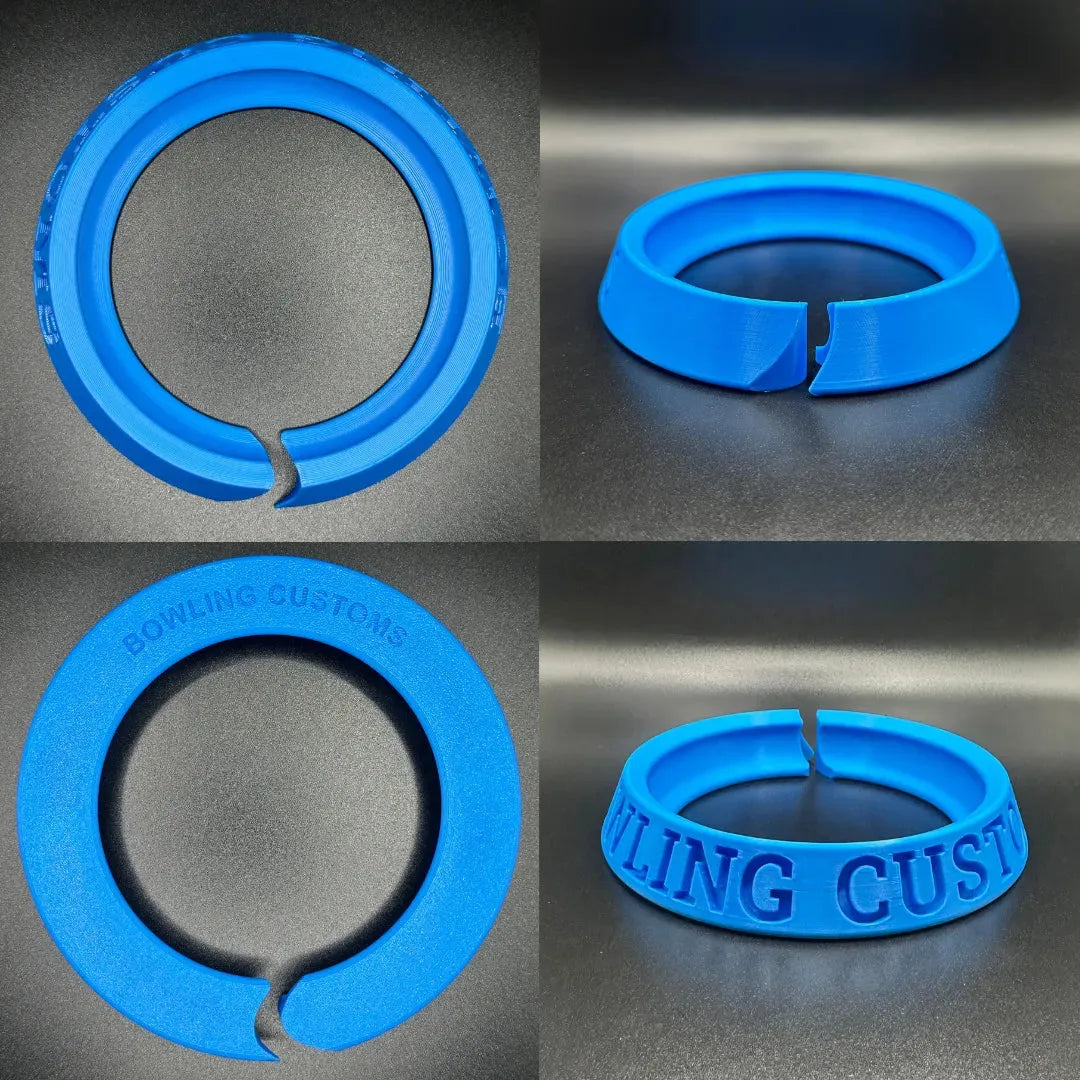 Blue rubber ring with 'Bowling Customs' branding on a dark surface