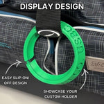 Green custom holder with text on a gray bag background