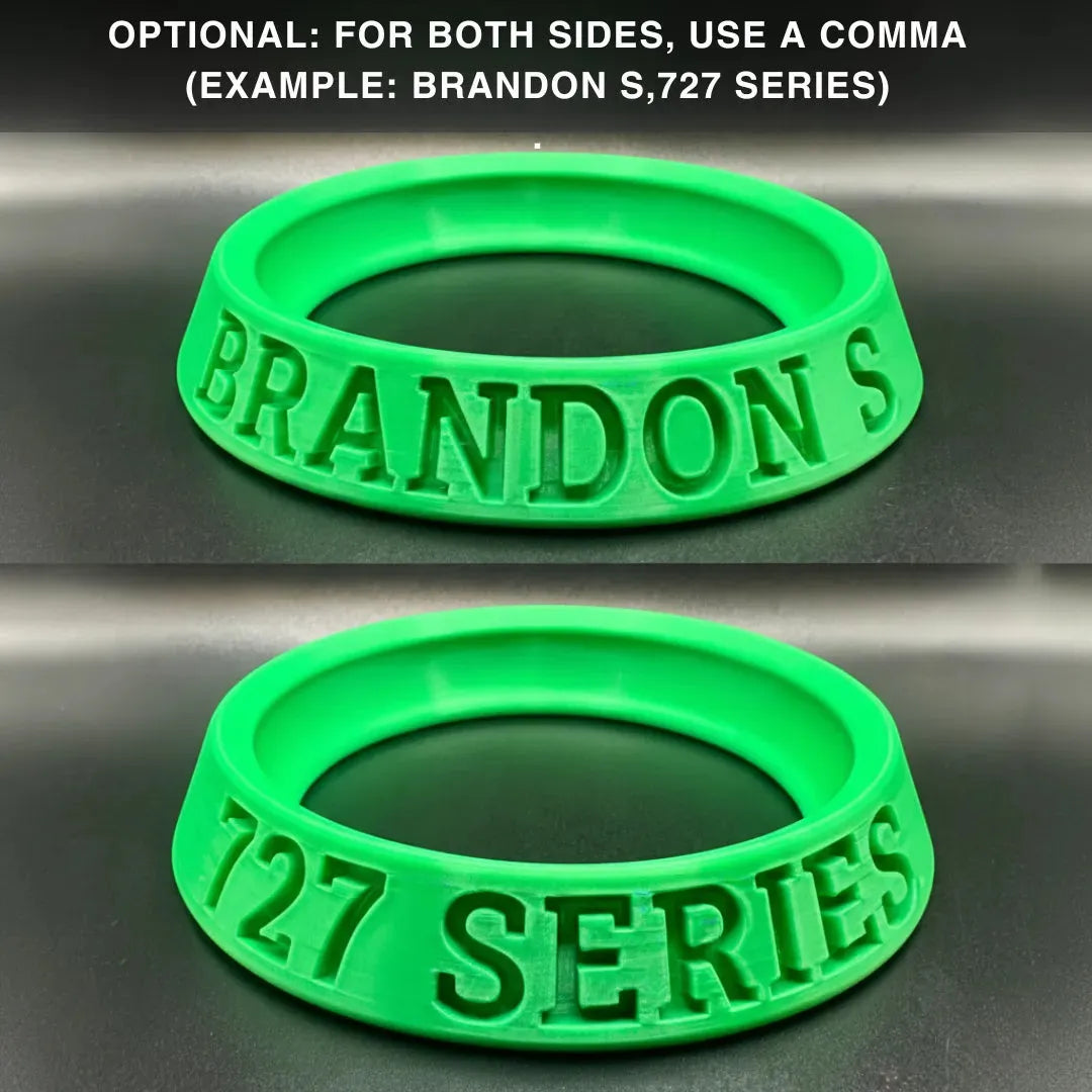Two green rubber rings with 'BRANDON S' and '727 SERIES' text on a metallic surface.